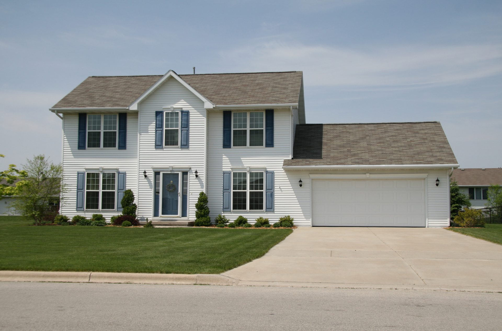 Big White house with garage